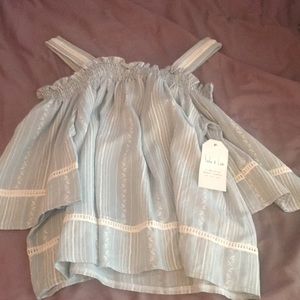 Light blue off the shoulder top